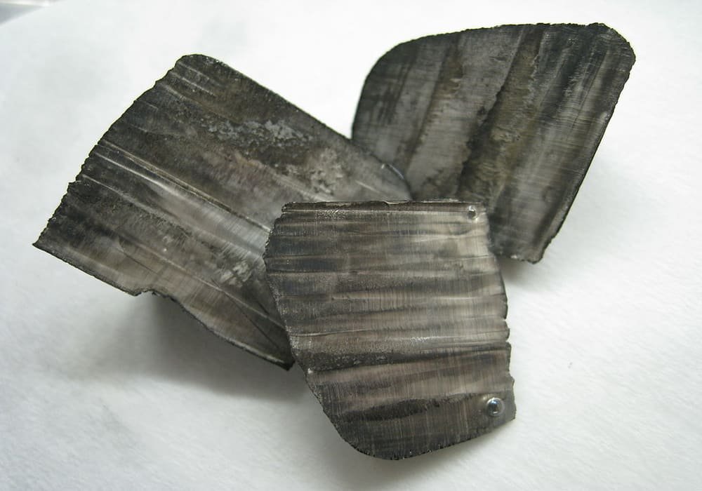 Lithium ingots with a thin layer of black nitride tarnish