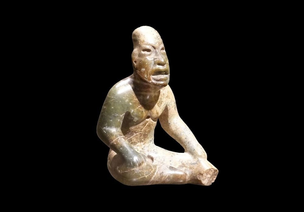 Sculpture of Olmecs figure of a man between 13th century and 10th century BC. Collection: Instituto Nacional de Antropología e Historia.