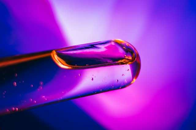 bromine chemical element illustrated by colored laboratory liquid