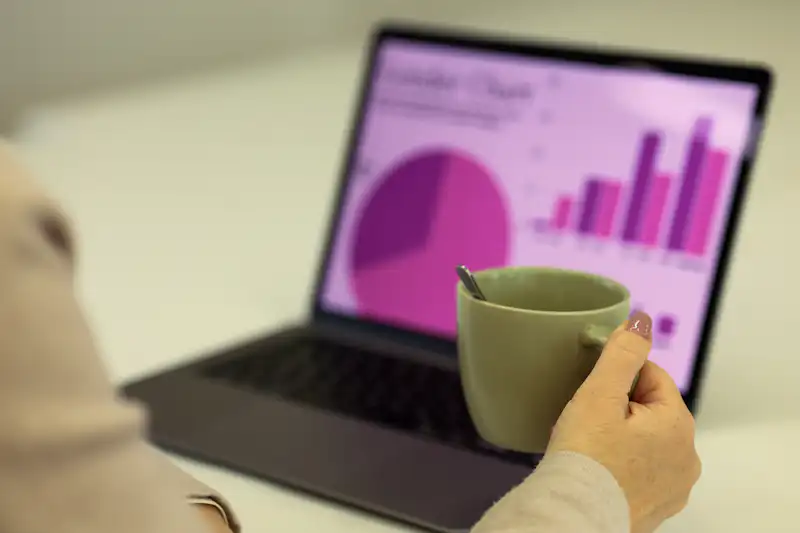 Analyst reviewing charts for a quality of earnings assessment